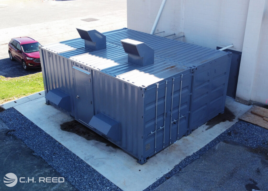 An overhead shot of the finished, custom shipping container compressed air system
